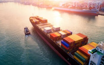sea freight Ship for container with working crane bridge in shipyard for Logistic Import Export background